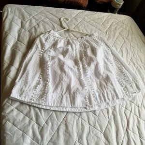 A white skirt with flowy patters